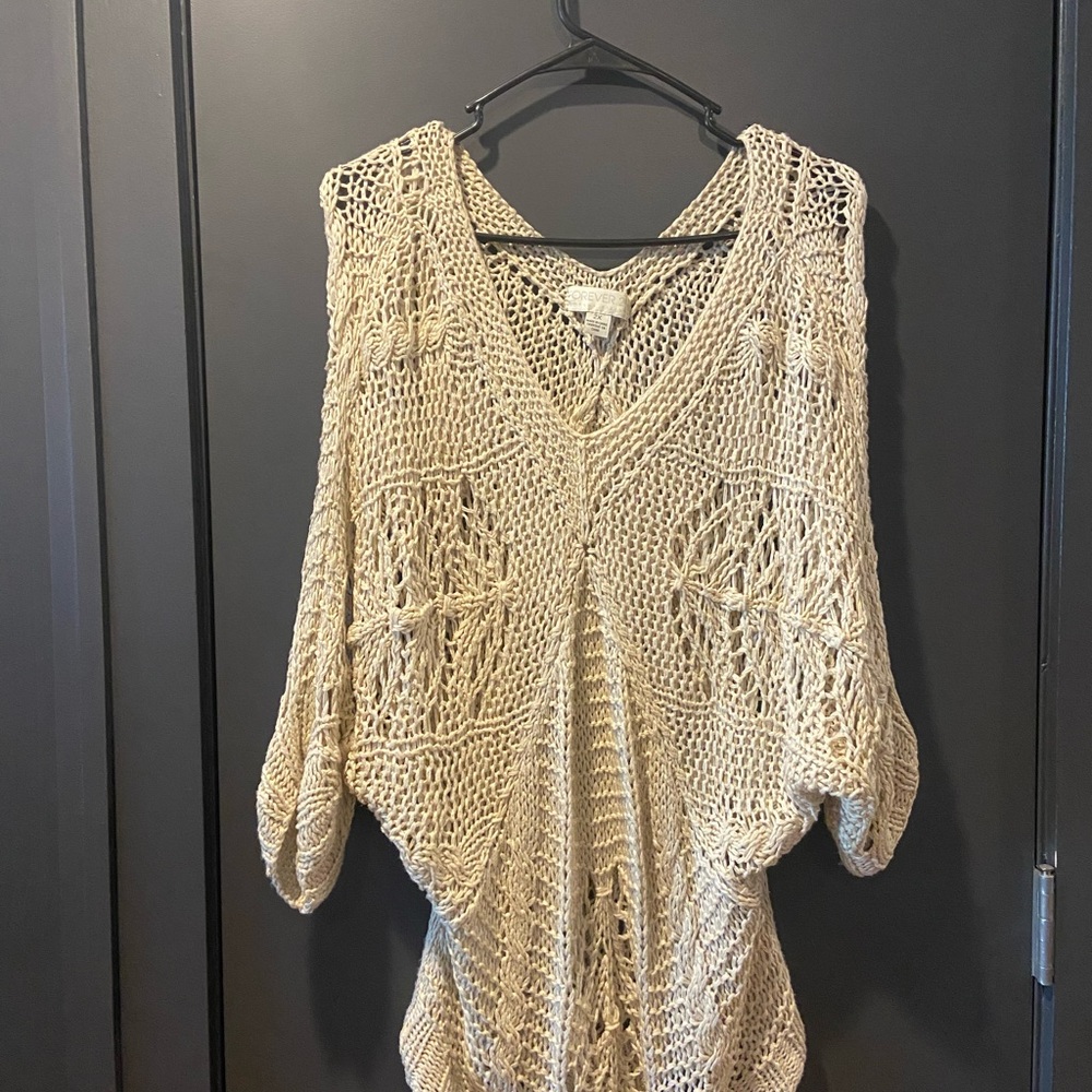 Cream colored plus-sized sweater